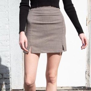 brandy melville brown pattern mini skirt with slit on thighs, one size